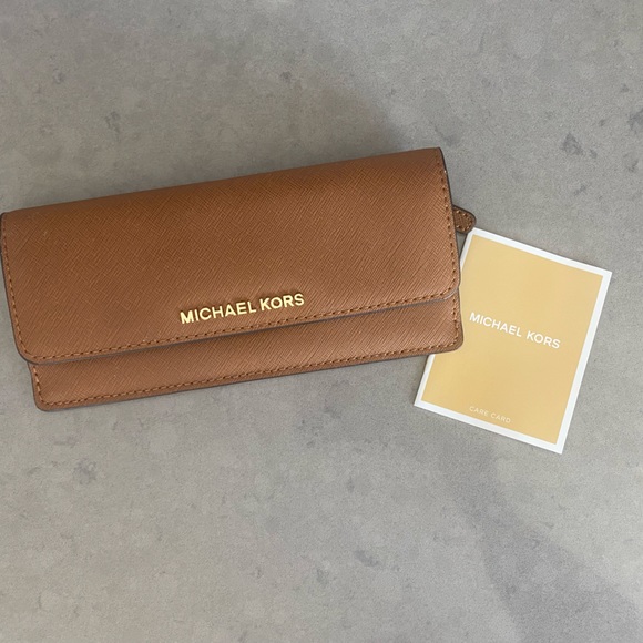 Michael Kors Handbags - Michael Kors Brown Saffiano Leather Jet Set Travel Flat Wallet
